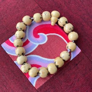 Free add on with bundle. Wooden bead bracelet with Chinese characters.